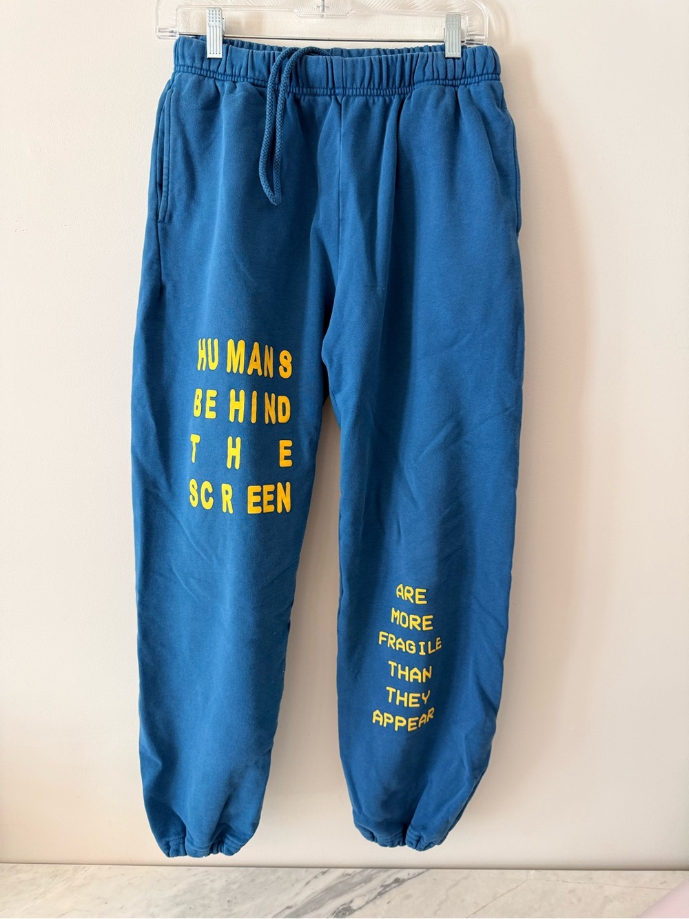 Blue Graphic Jogger Pants with Yellow Text